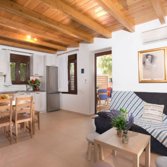 Louisa Apartment kitchen and living area – Houmeli Apartments, Kalamaki Crete.