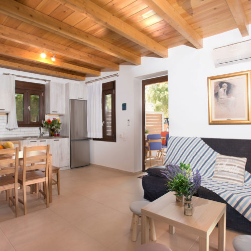 Louisa Apartment kitchen and living area – Houmeli Apartments, Kalamaki Crete.