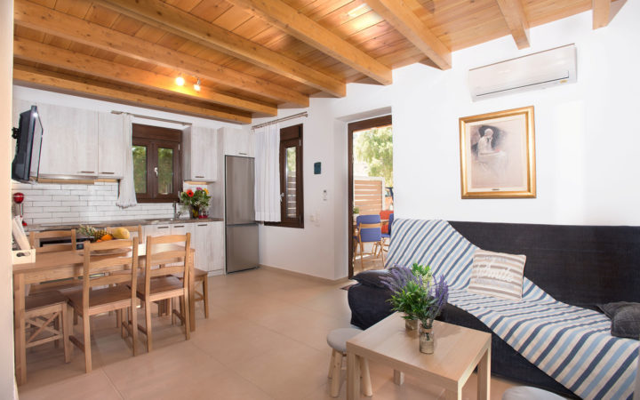 Louisa Apartment kitchen and living area – Houmeli Apartments, Kalamaki Crete.