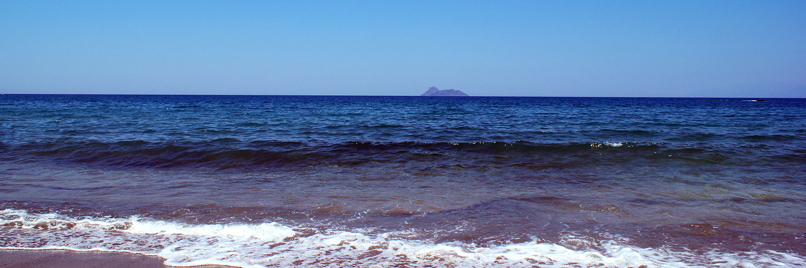 Kalamaki Beach, Crete – shoreline and blue sea.